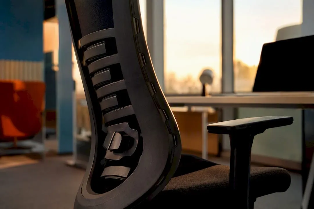 Close-up of flexible dynamic lumbar support in office chair