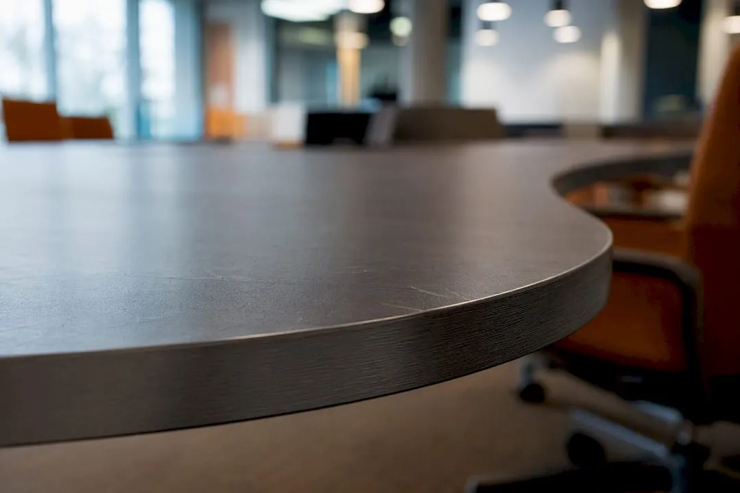 Laminate meeting table surface and sturdy edge