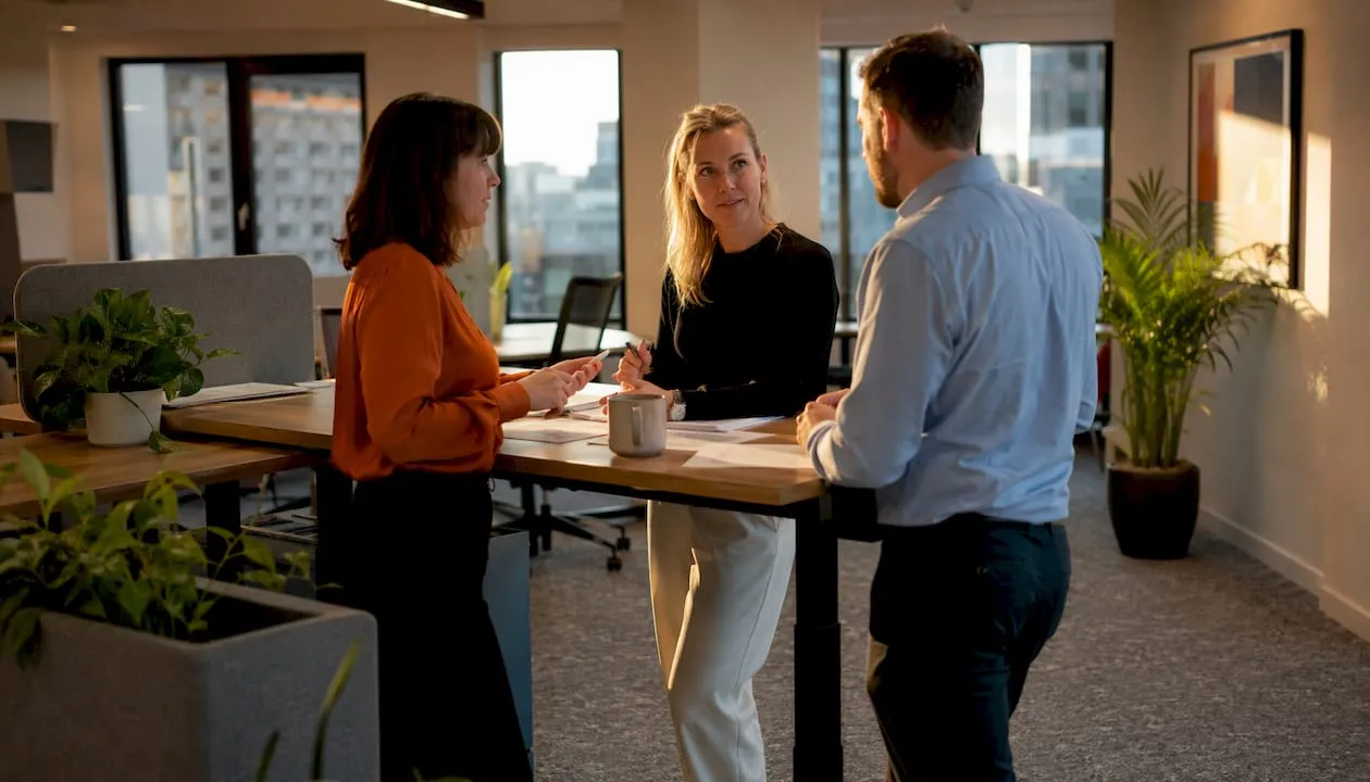 Team discussing open desking layout options