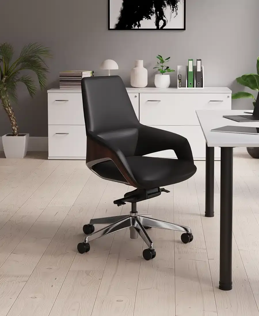Leather executive office chair at a white desk