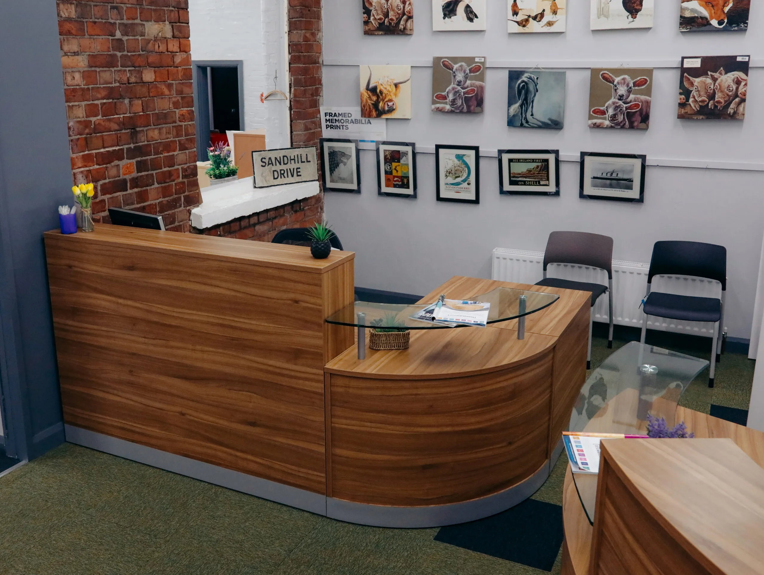 Walnut reception desk and visitor chairs