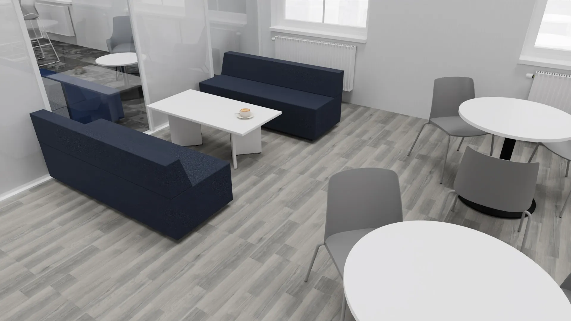 3D design visual: breakout area with navy sofas