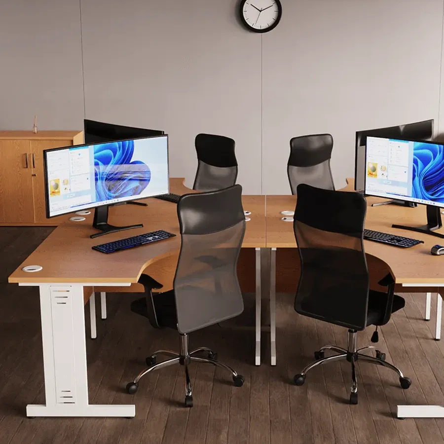 Oak corner desks with white frames and mesh chairs
