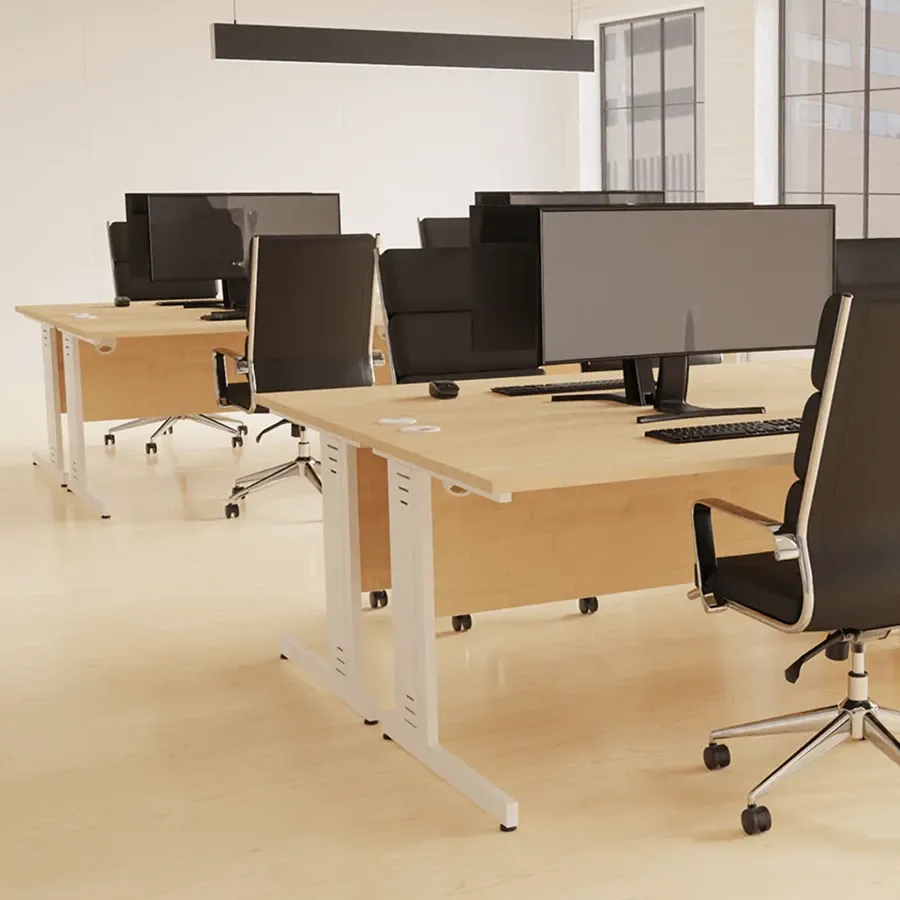 Maple cable managed desks with monitors and black chairs