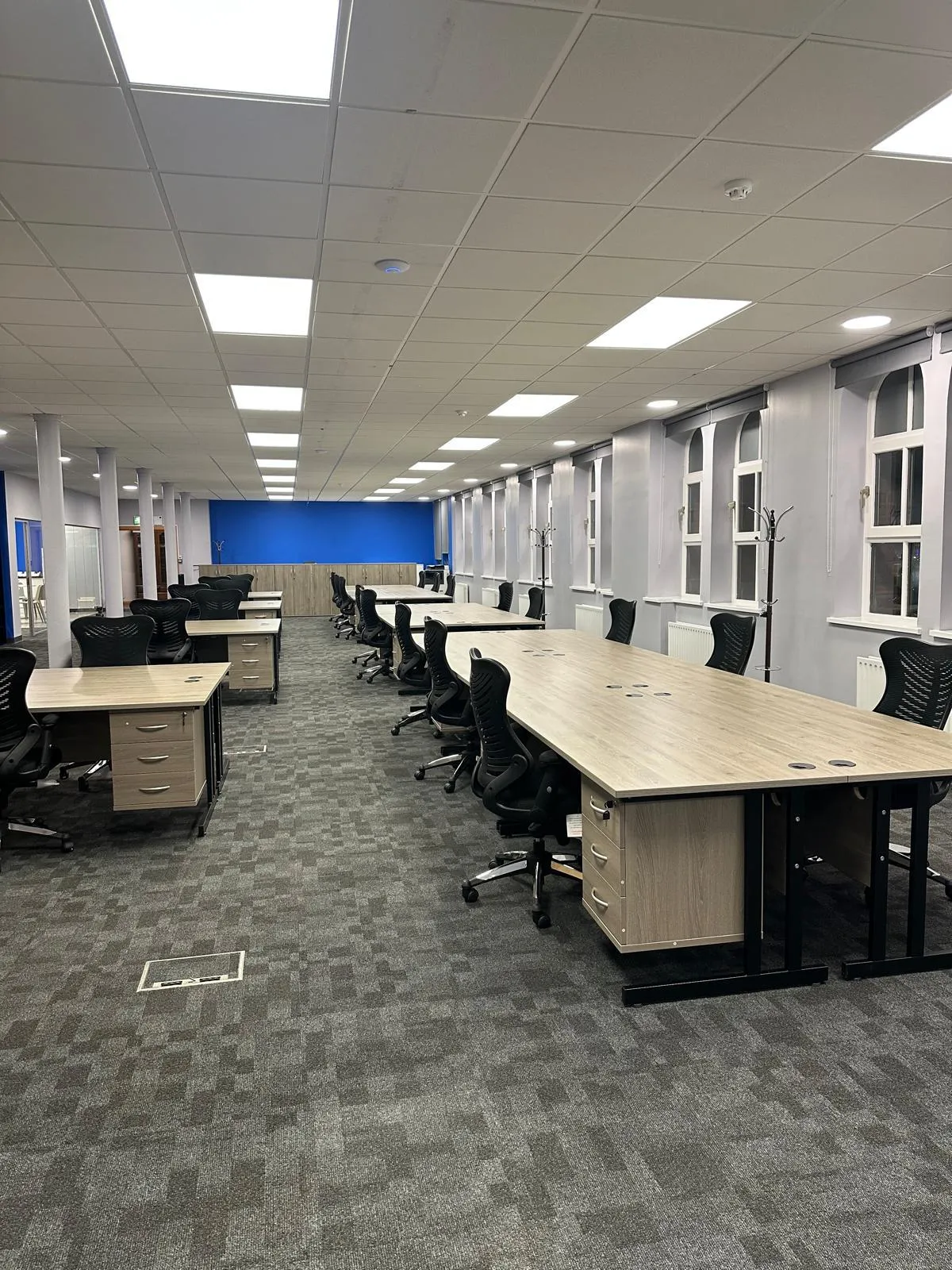 Open-plan office with long bench desks