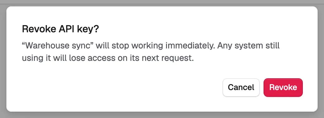The Revoke API key dialog confirming that the key stops working immediately.