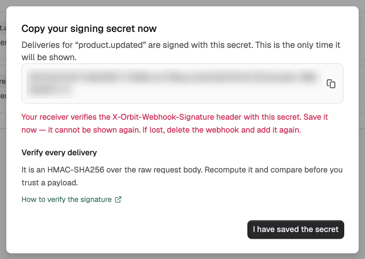 The Copy your signing secret now dialog, the only place Orbit shows the secret for a new webhook.